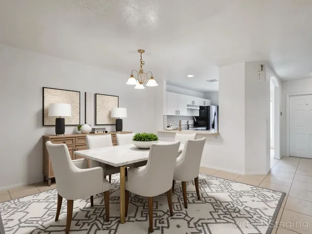 a view of a dining room with furniture