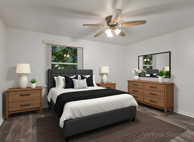 a bedroom with a bed and a dresser