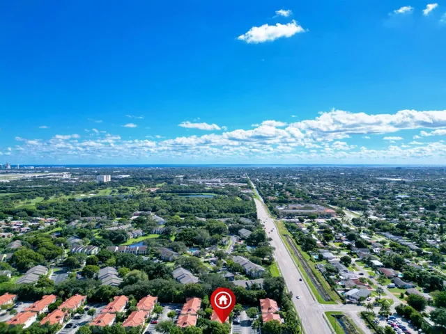 a view of city and flowers