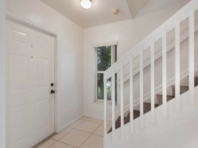 a view of an entryway with staircase