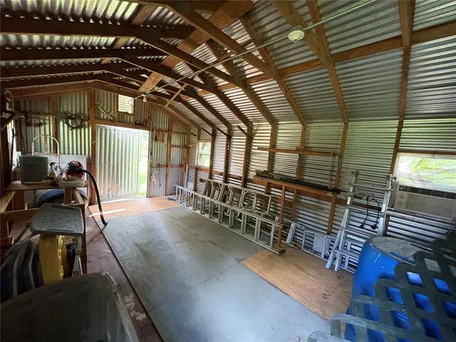 a view of a park with large trees