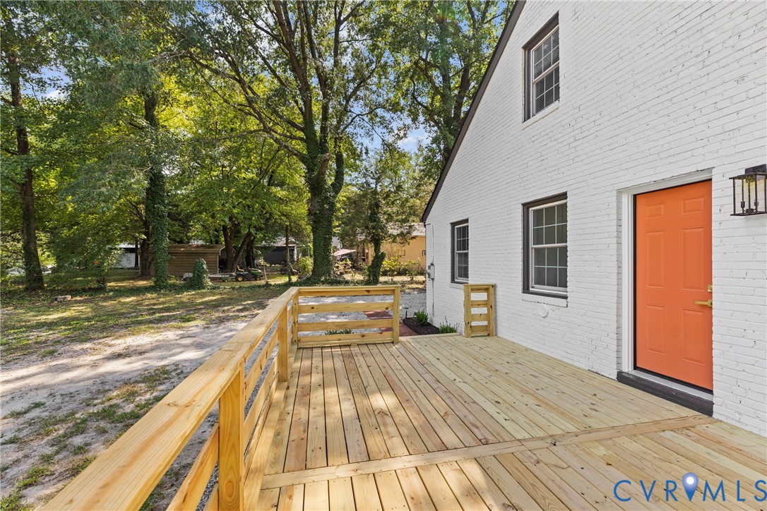 821 Fort Lee Road Petersburg, VA 23803 - Photo 34 of 45 Expansive wood deck with a natural wood railing, w