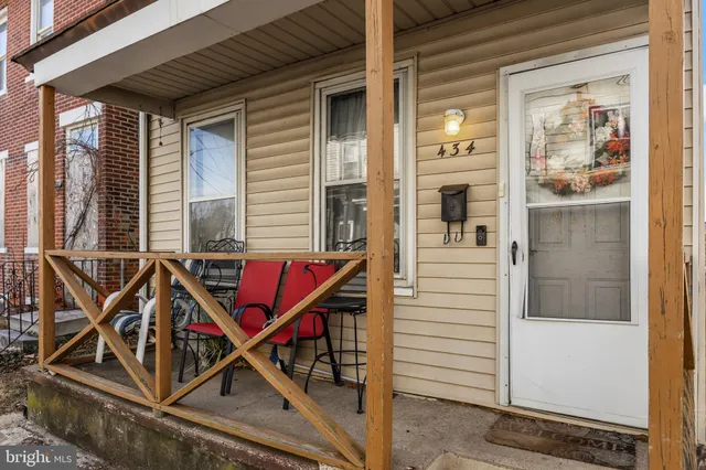 a front view of a house with entryway