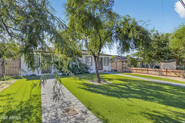 a swimming pool with wooden fence