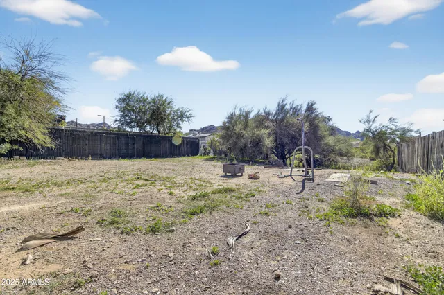 a backyard of a house with lots of green space
