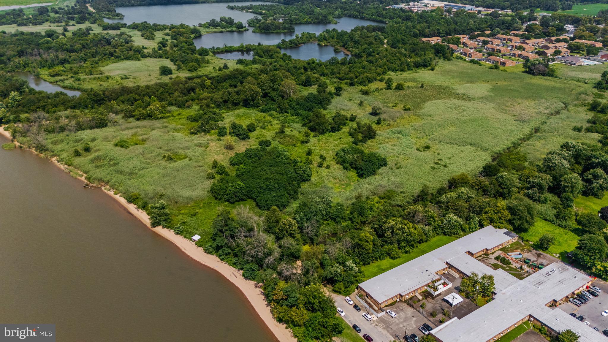 81 7th Avenue Carneys Point, NJ 08069 - Photo 13 of 23 an aerial view of a house with a yard