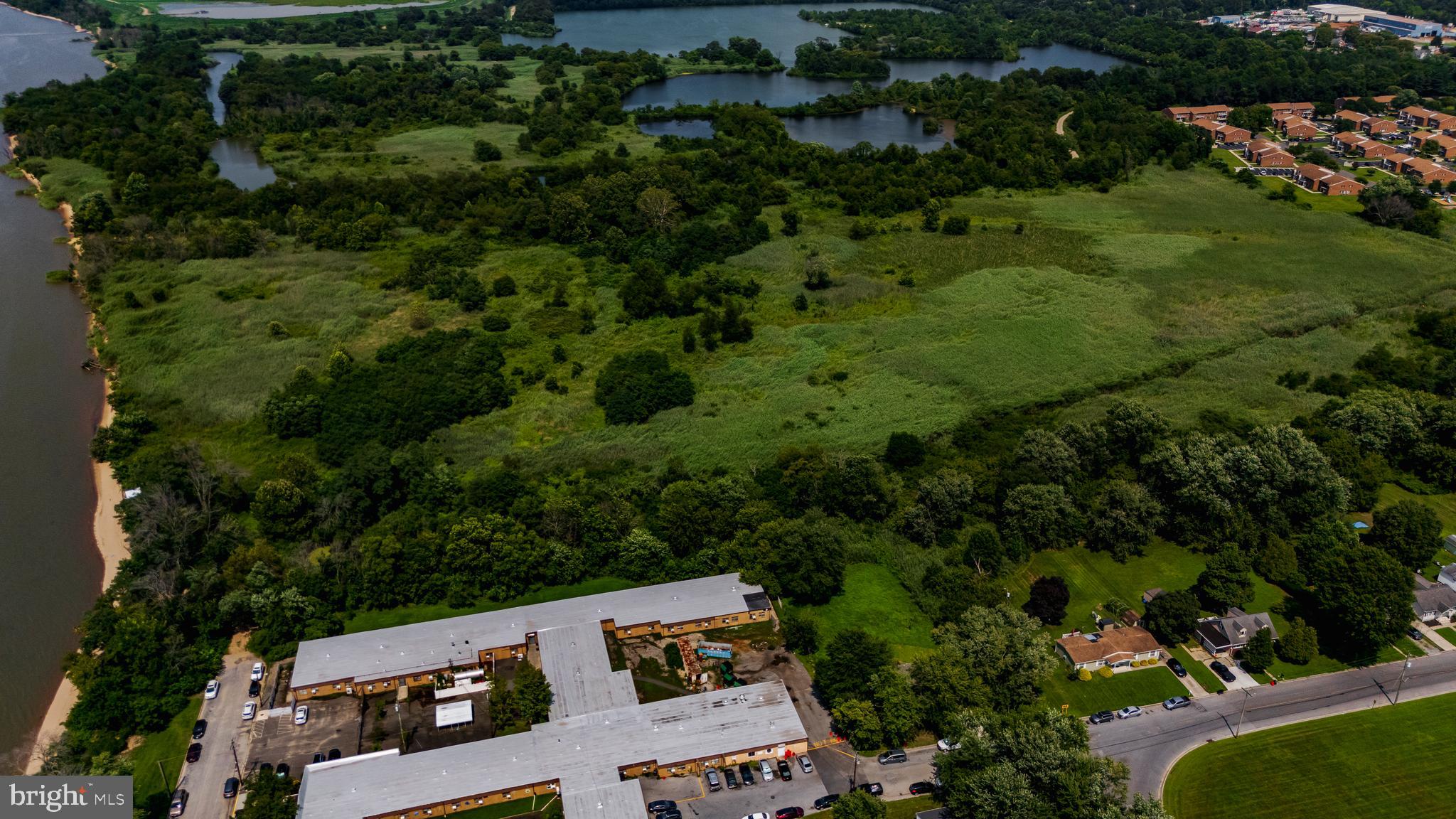 81 7th Avenue Carneys Point, NJ 08069 - Photo 14 of 23 an aerial view of a house with a yard
