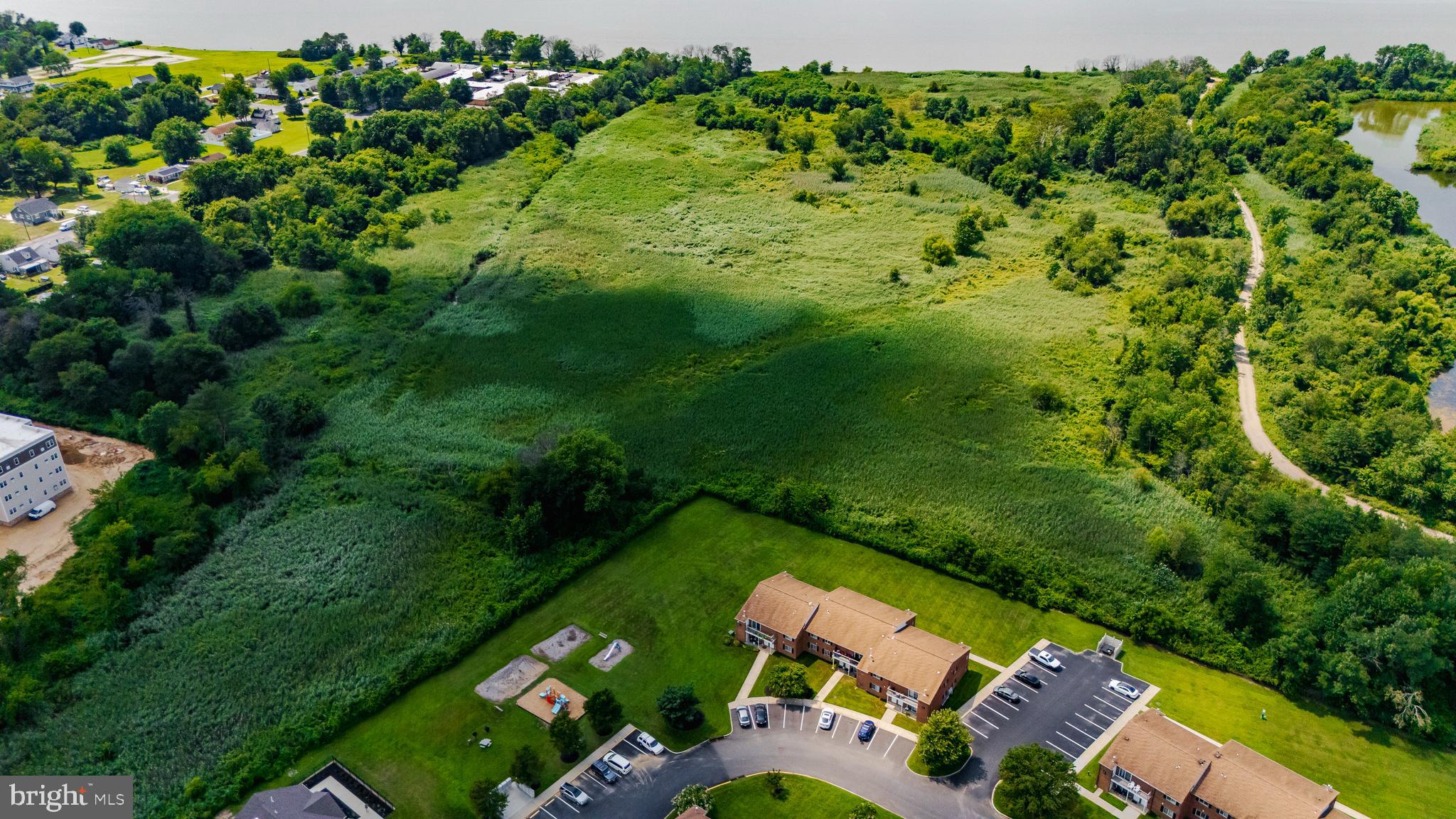 81 7th Avenue Carneys Point, NJ 08069 - Photo 5 of 23 an aerial view of a house with a yard