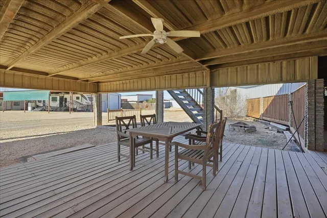 a kitchen with stainless steel appliances granite countertop a refrigerator and a stove