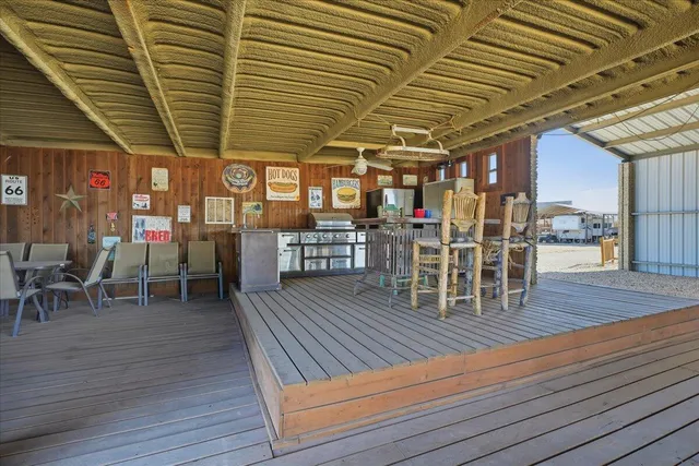 a view of a chairs with wooden floor