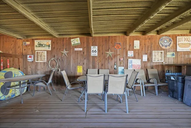 a view of gallery with wooden floor