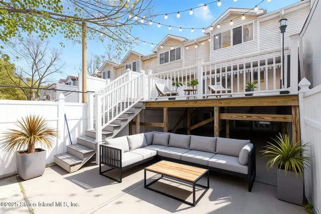 a picture of a park with a white wall