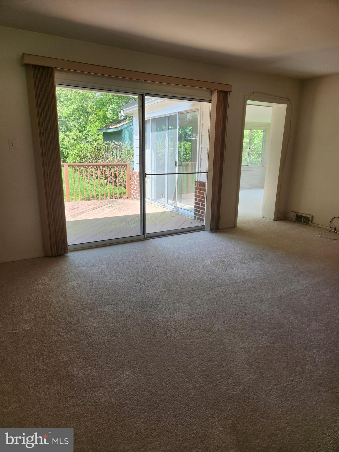 7510 Hogarth Street Springfield, VA 22151 - Photo 21 of 47 Sliding door in living room leads out to back deck