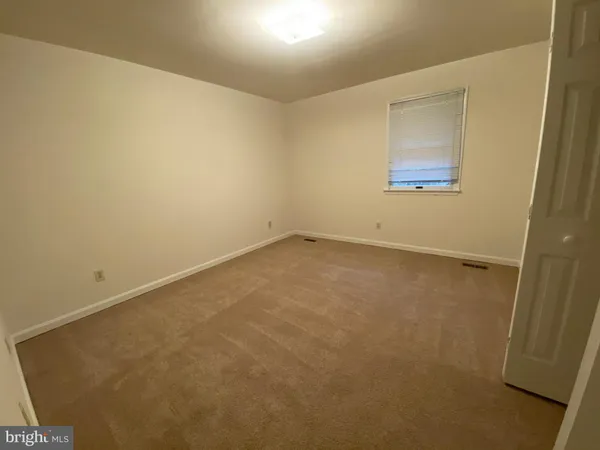 an empty room with a door