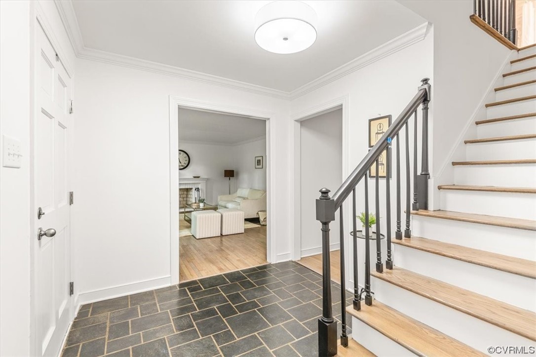 13611 Thorngate Road Midlothian, VA 23113 - Photo 2 of 49 a view of a hallway with wooden floor and cabinet
