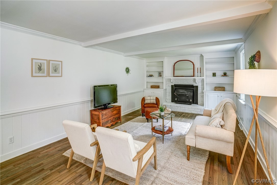 13611 Thorngate Road Midlothian, VA 23113 - Photo 21 of 49 a living room with furniture fireplace and a flat screen tv