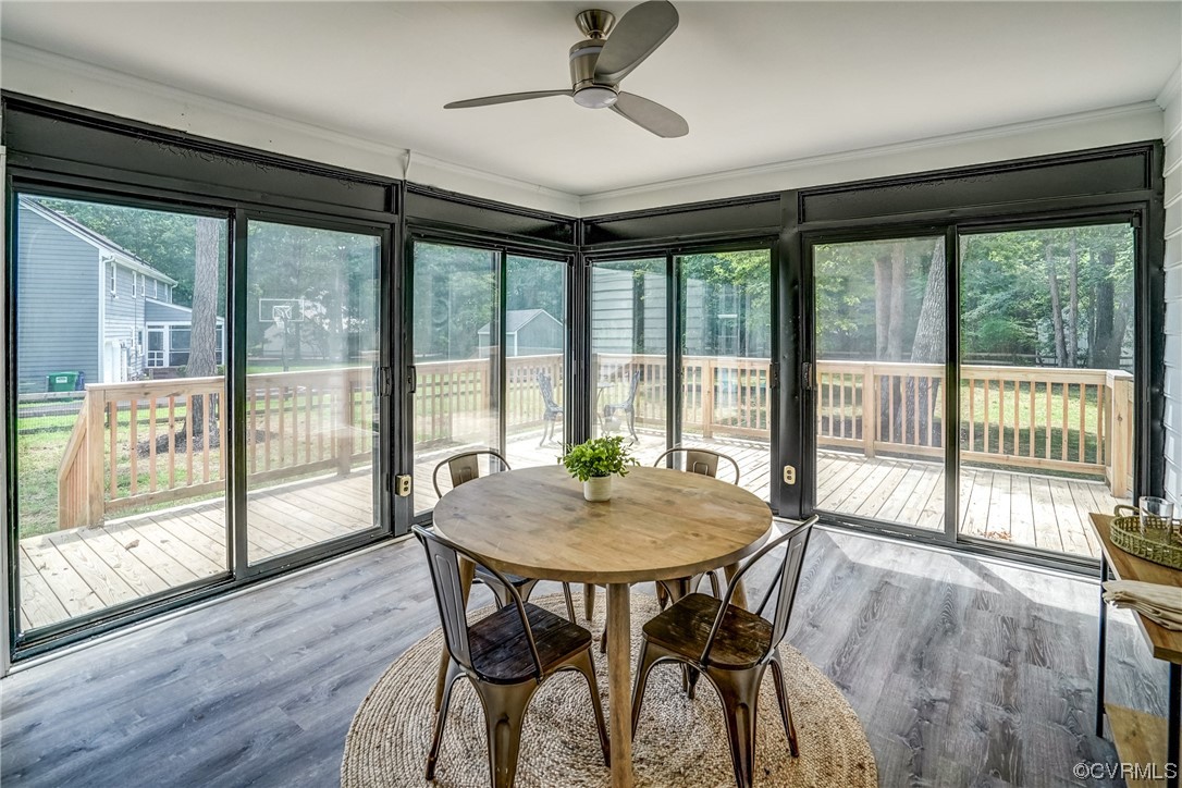13611 Thorngate Road Midlothian, VA 23113 - Photo 24 of 49 a dining room with furniture window and wooden floor