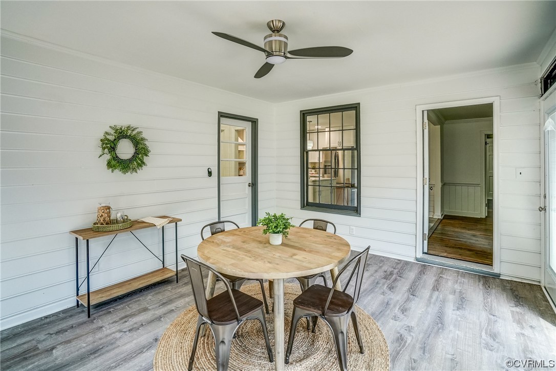 13611 Thorngate Road Midlothian, VA 23113 - Photo 25 of 49 a view of a dining room with furniture window and wooden floor