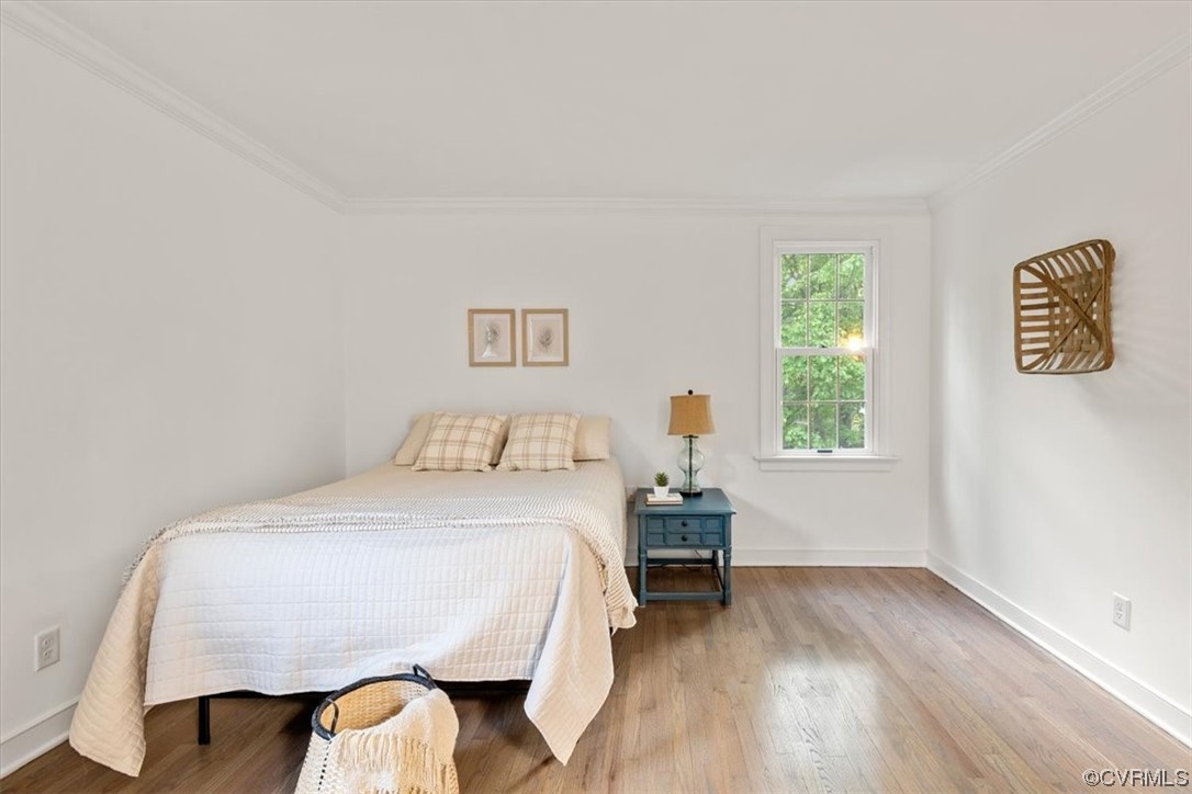13611 Thorngate Road Midlothian, VA 23113 - Photo 36 of 49 a bedroom with a bed and a window
