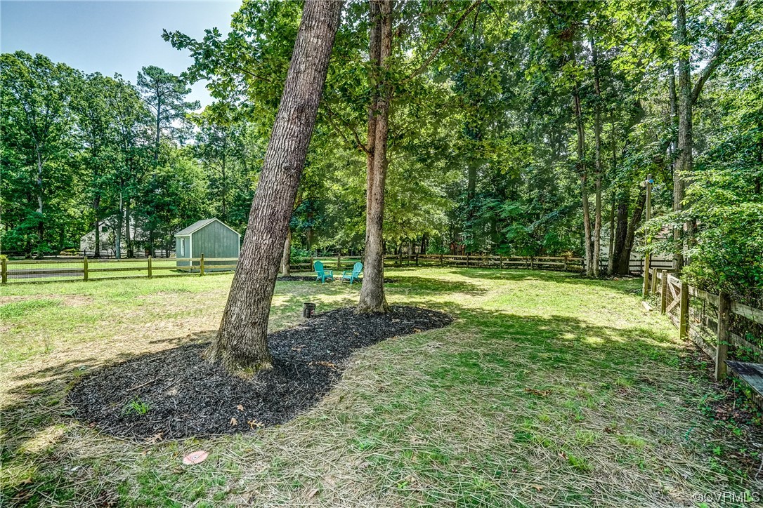 13611 Thorngate Road Midlothian, VA 23113 - Photo 47 of 49 a view of a field with a tree