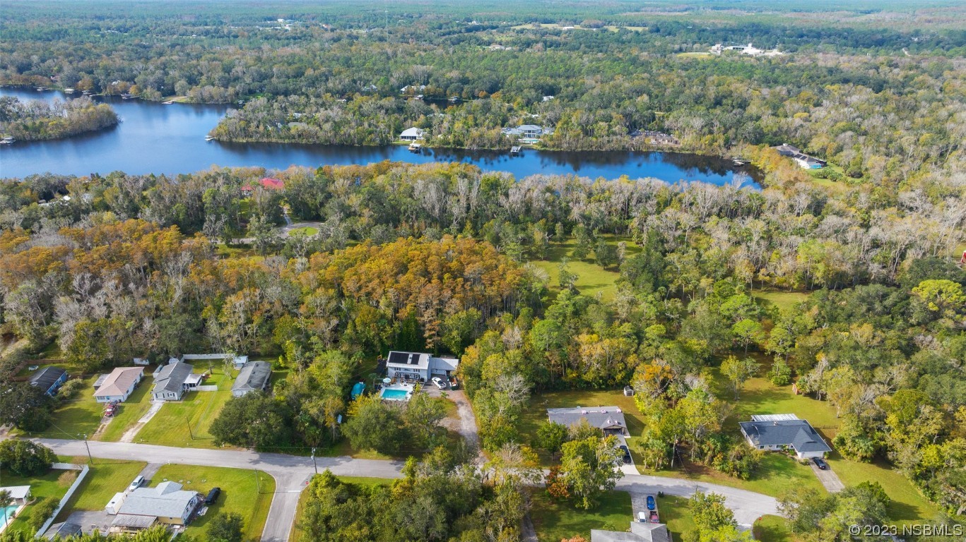 0 Bolton Road New Smyrna Beach, FL 32168 - Photo 15 of 18 an aerial view of residential houses with outdoor space
