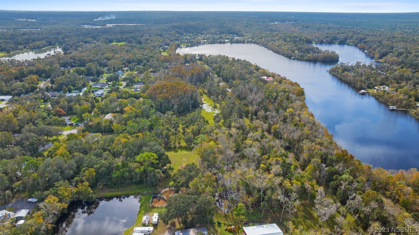 0 Bolton Road New Smyrna Beach, FL 32168 - Photo 18 of 18 an aerial view of houses with yard