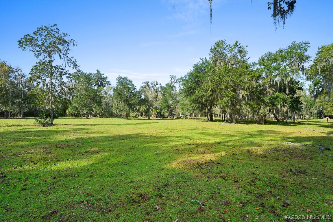 0 Bolton Road New Smyrna Beach, FL 32168 - Photo 4 of 18 a view of outdoor space with deck and yard