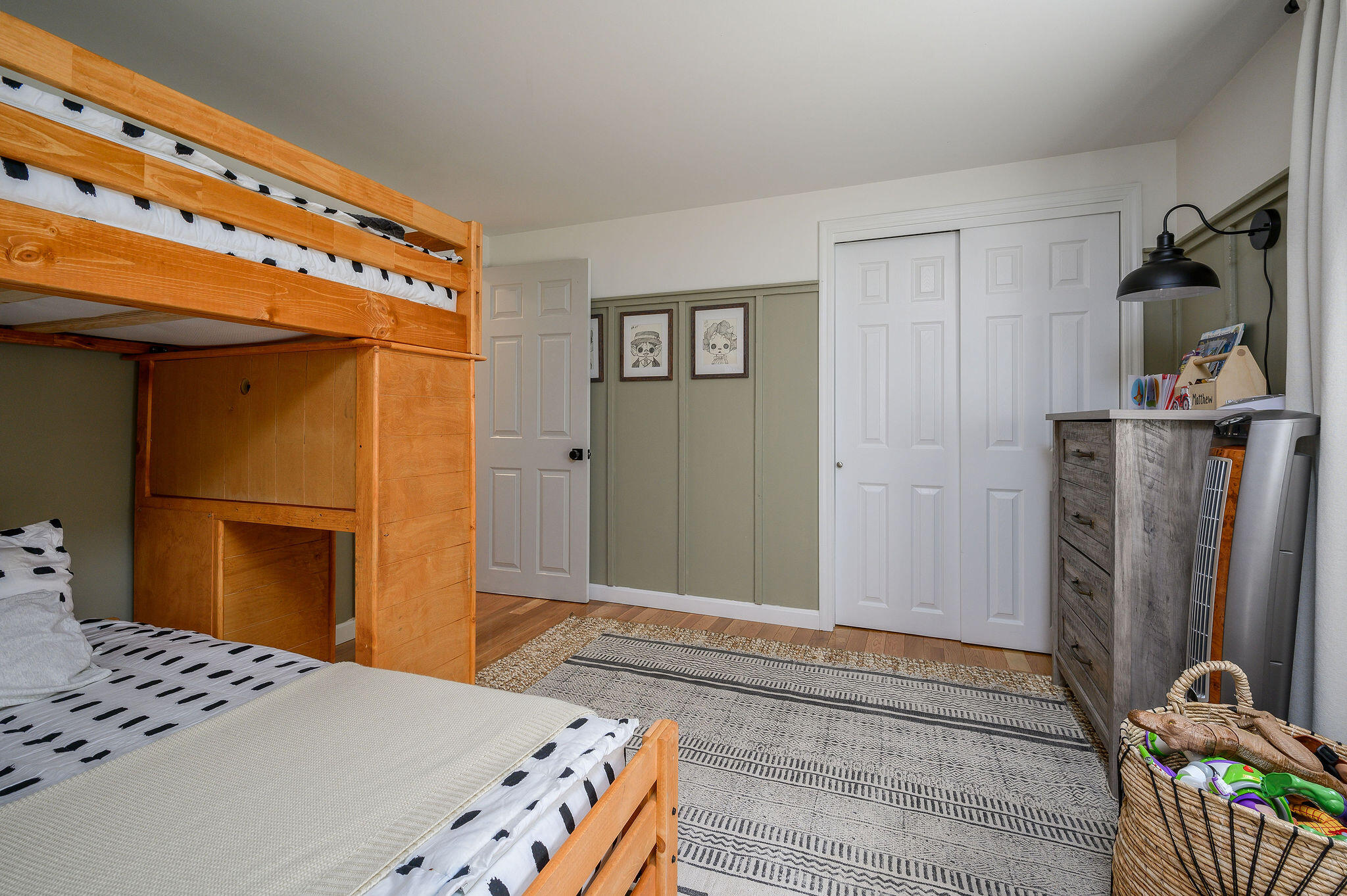 13 Crowell Road Sandwich, MA 02563 - Photo 18 of 33 a bedroom with a bed and wooden floor