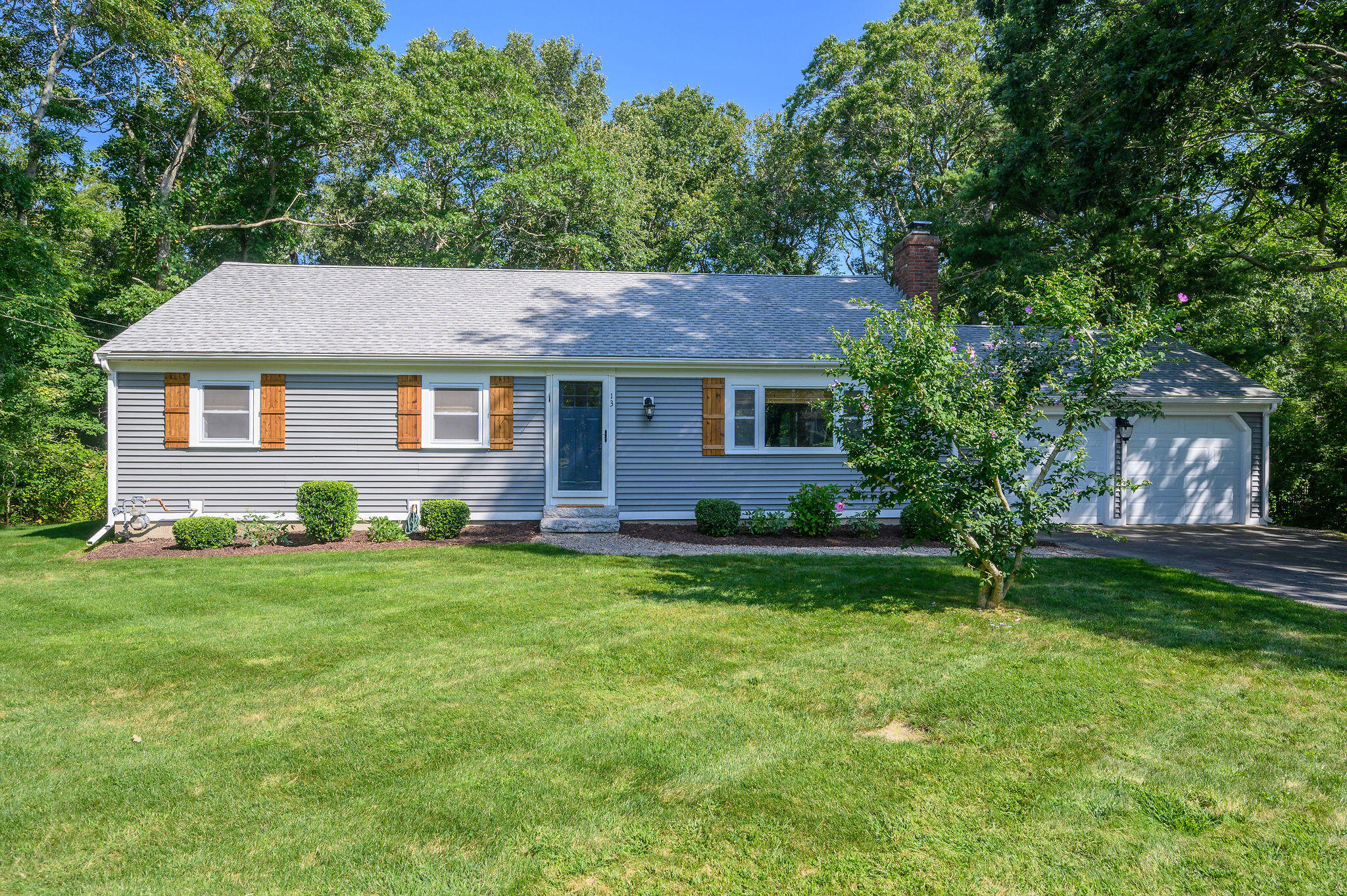 13 Crowell Road Sandwich, MA 02563 - Photo 3 of 33 a house view with a garden space