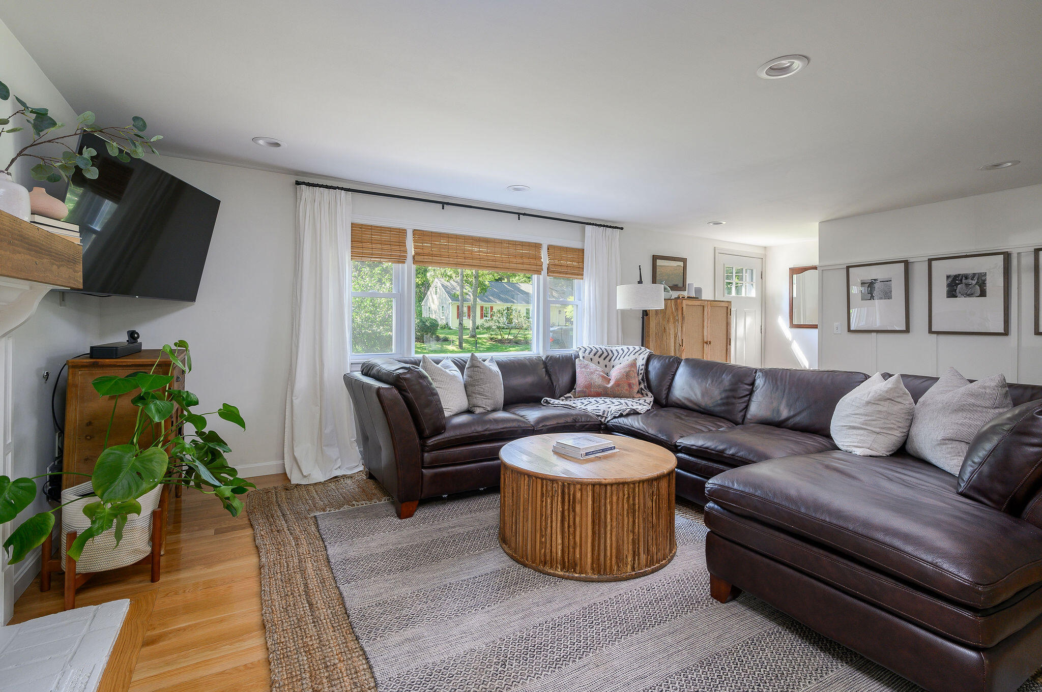 13 Crowell Road Sandwich, MA 02563 - Photo 8 of 33 a living room with furniture and a flat screen tv