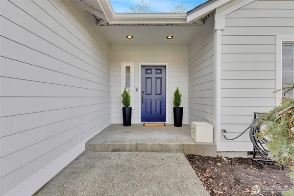 a view of a back yard of the house