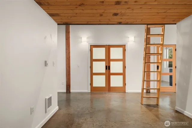 an empty room with windows