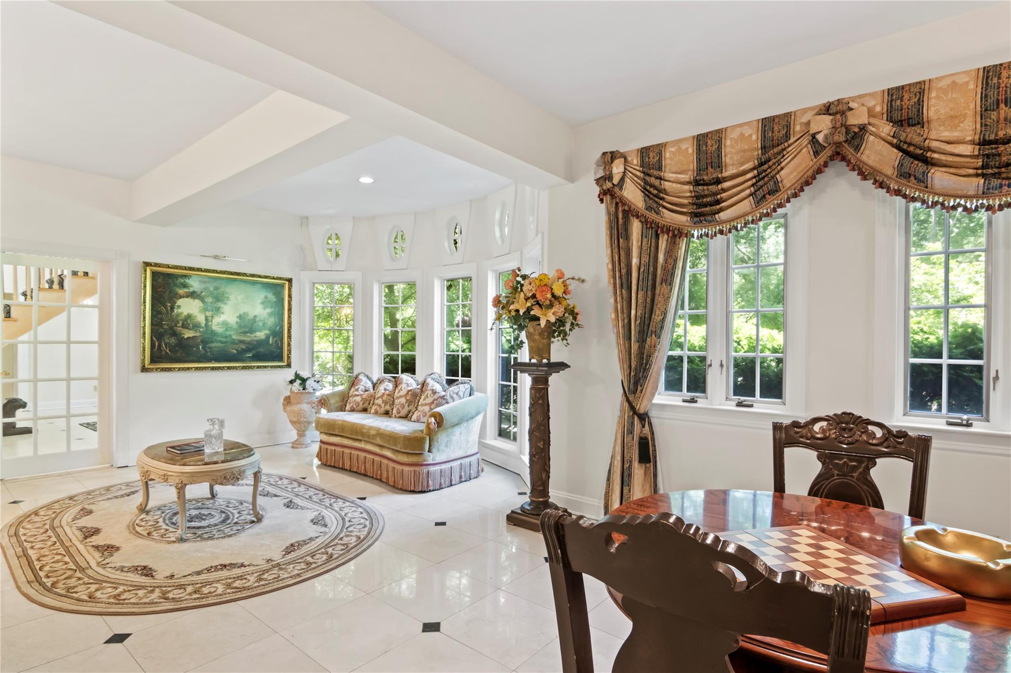 358 Centre Island Road Centre Island, NY 11771 - Photo 11 of 39 a living room with furniture a window and a table