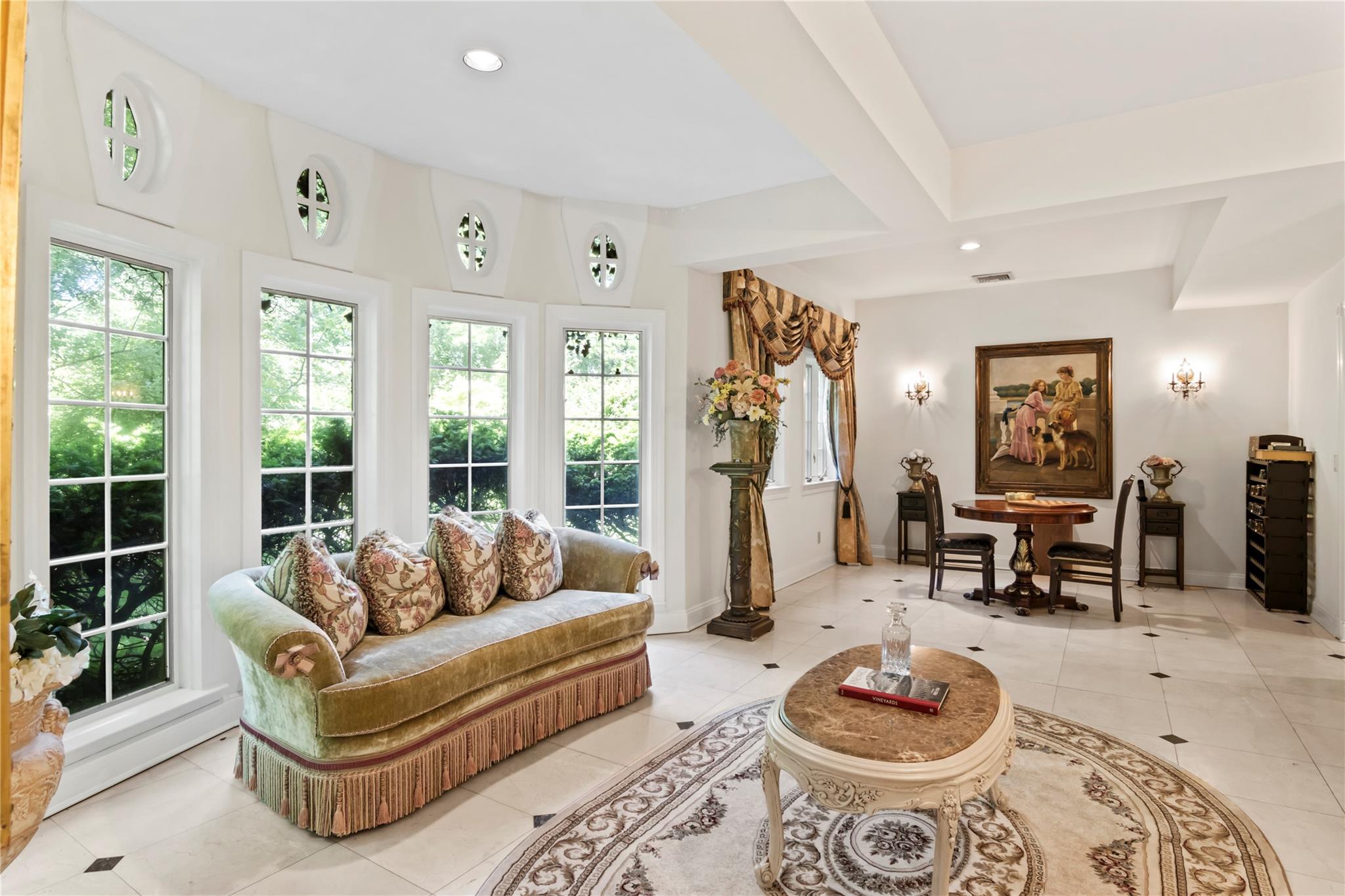 358 Centre Island Road Centre Island, NY 11771 - Photo 13 of 39 a living room with furniture and a large window