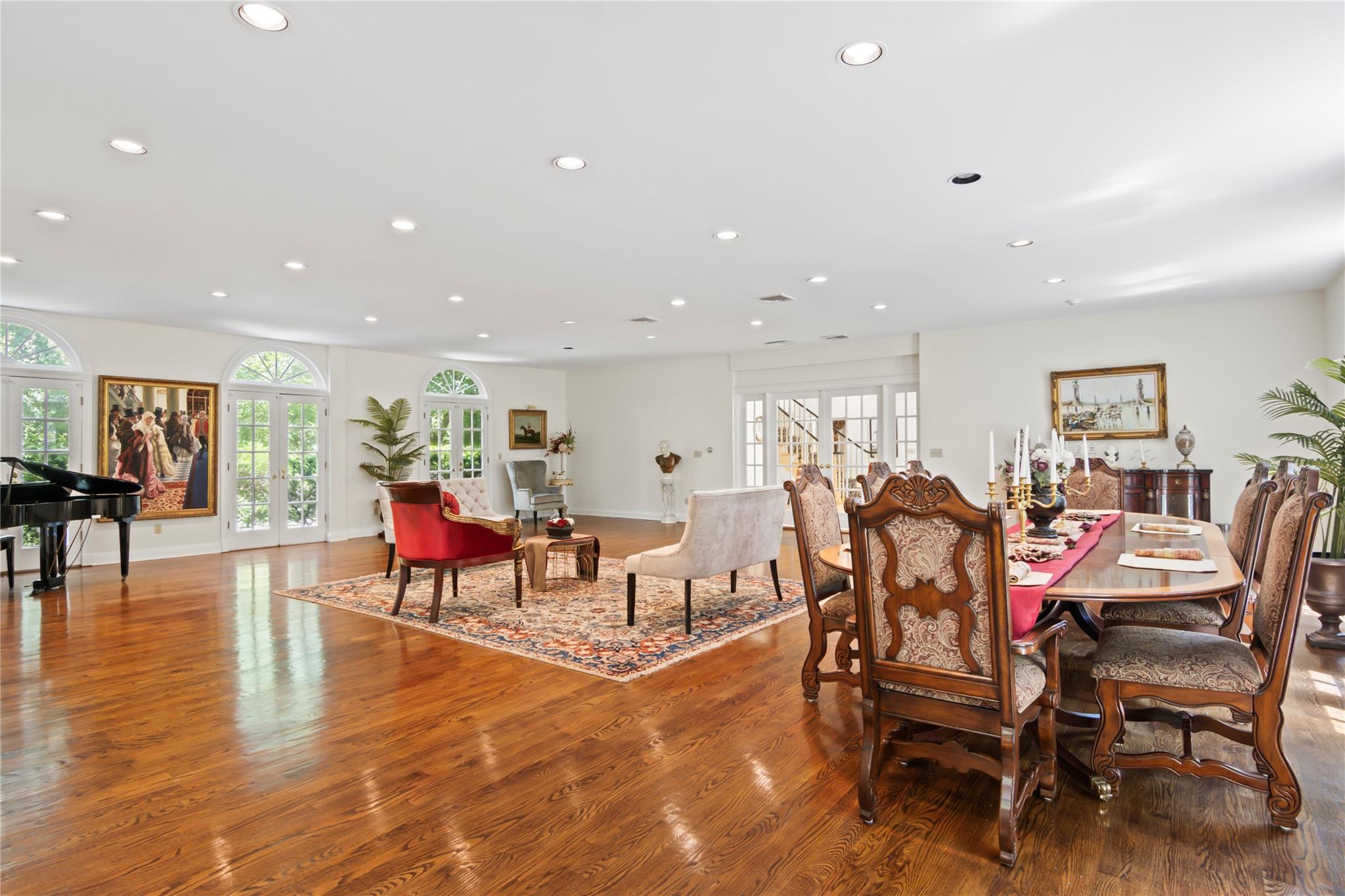 358 Centre Island Road Centre Island, NY 11771 - Photo 15 of 39 a view of a dining room with furniture and wooden floor
