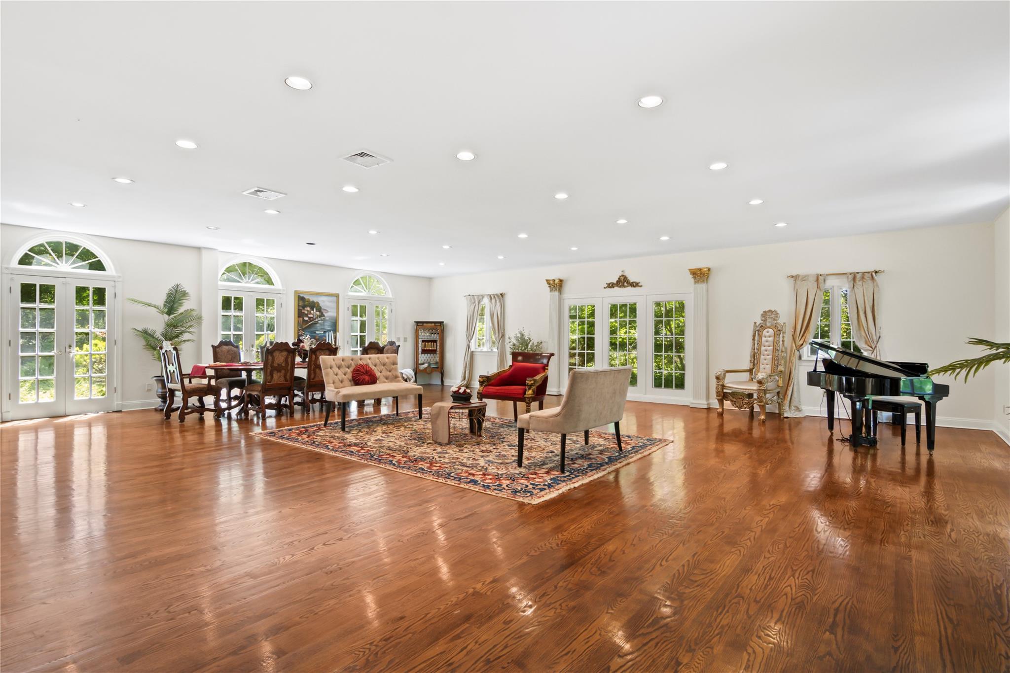 358 Centre Island Road Centre Island, NY 11771 - Photo 27 of 39 a living room with furniture and wooden floor