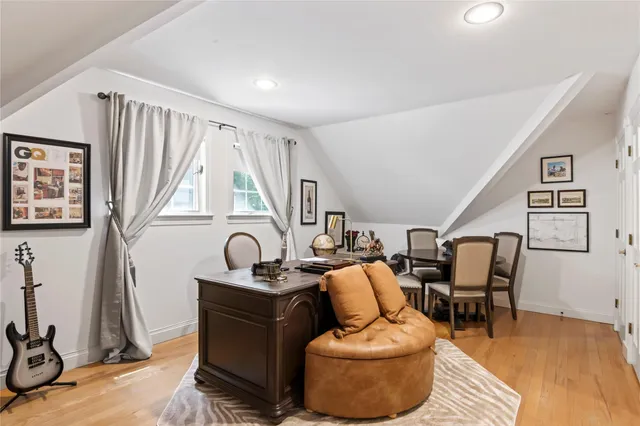 a workspace with furniture and window