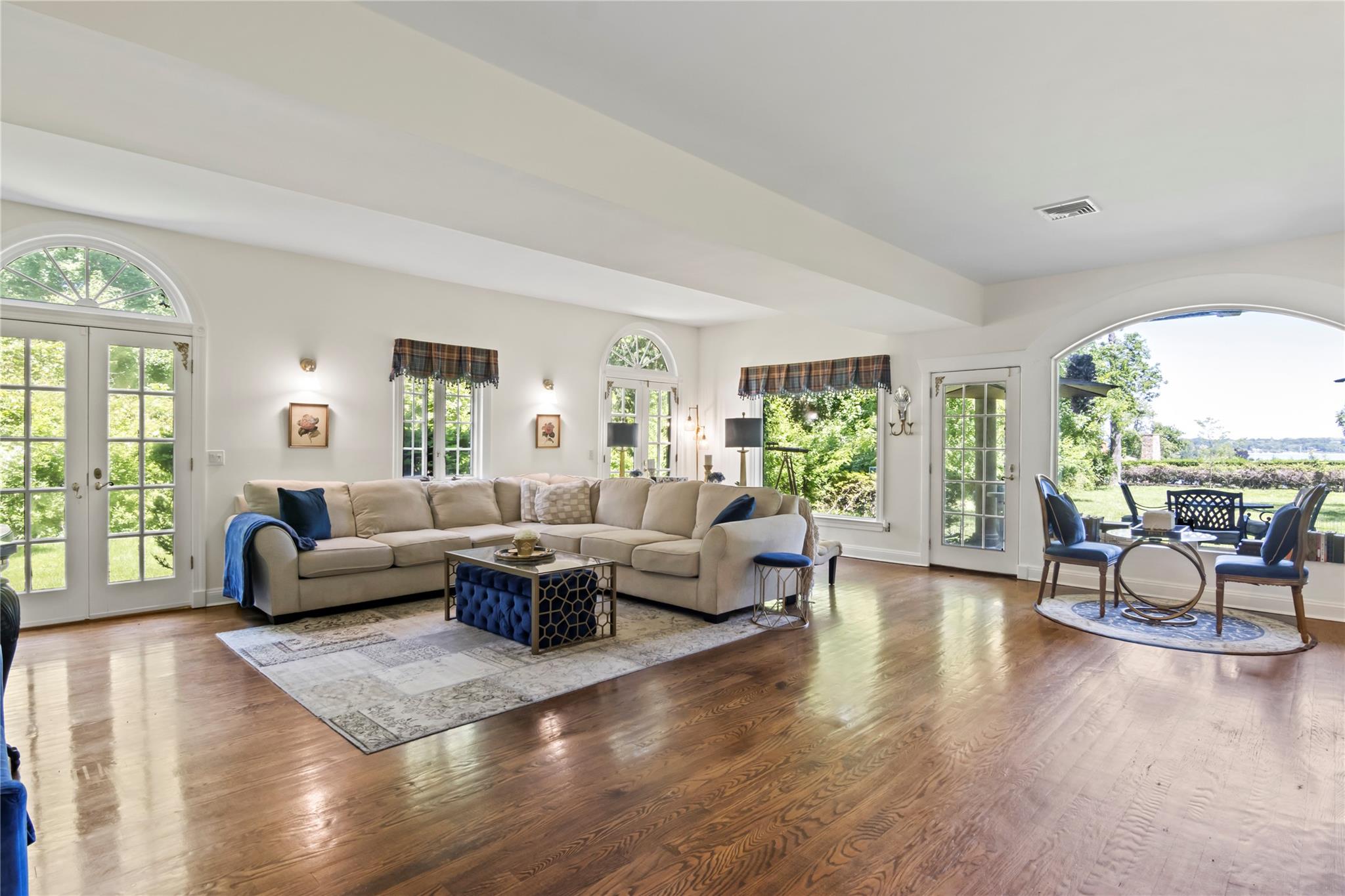 358 Centre Island Road Centre Island, NY 11771 - Photo 7 of 39 a living room with furniture and a large window