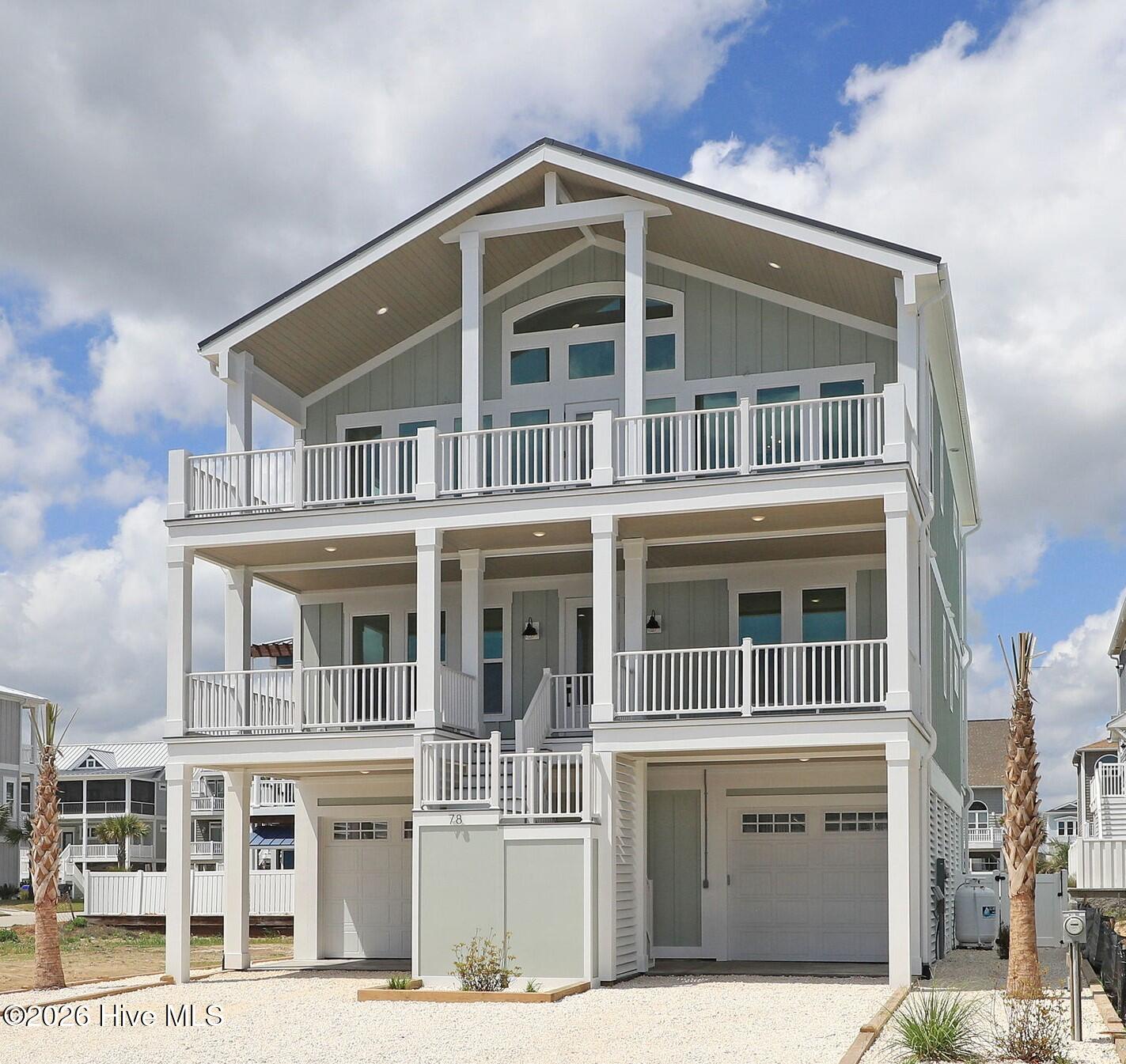 90 West First Street Ocean Isle Beach, NC 28469 - Photo 1 of 37 90 W 1st front marketing photo