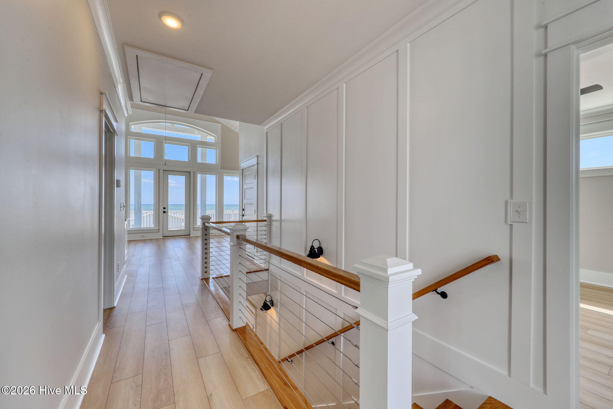 90 West First Street Ocean Isle Beach, NC 28469 - Photo 21 of 37 Hall and Stair Railing