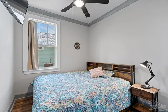 a bedroom with a bed and a closet