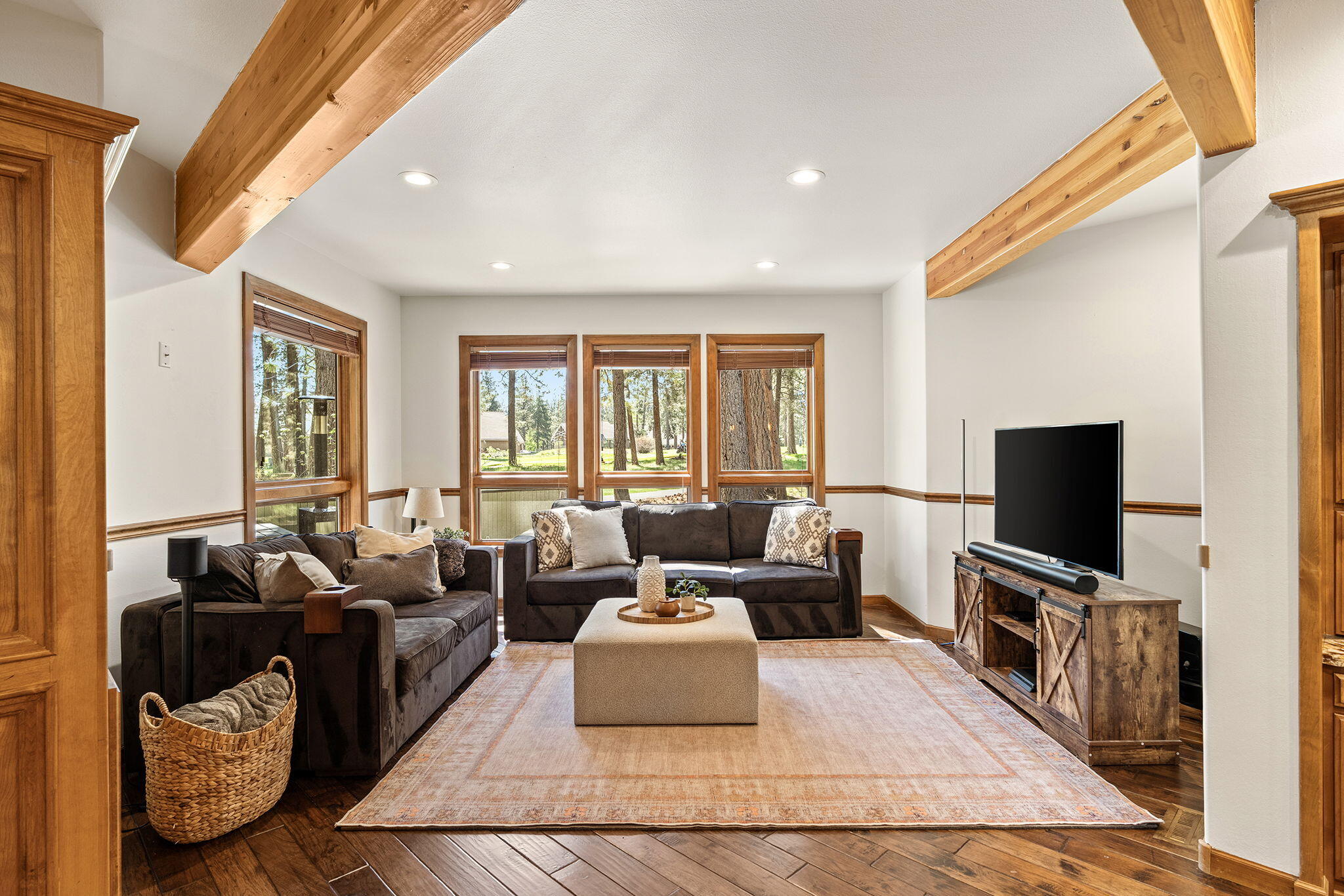 60766 Golf Village Loop Bend, OR 97702 - Photo 11 of 63 a living room with furniture and a flat screen tv