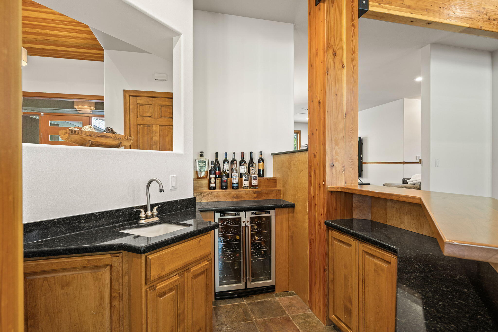 60766 Golf Village Loop Bend, OR 97702 - Photo 18 of 63 a kitchen with a sink and a cabinets