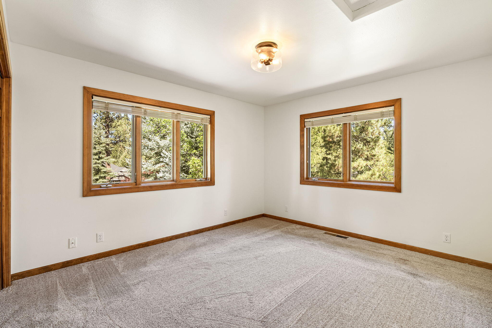 60766 Golf Village Loop Bend, OR 97702 - Photo 33 of 63 an empty room with windows