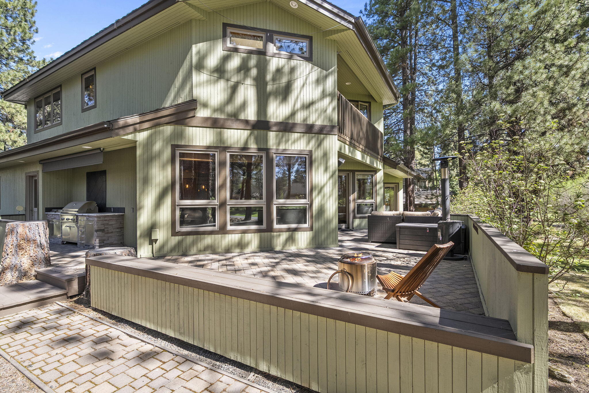 60766 Golf Village Loop Bend, OR 97702 - Photo 43 of 63 a view of a roof deck with couches and wooden floor