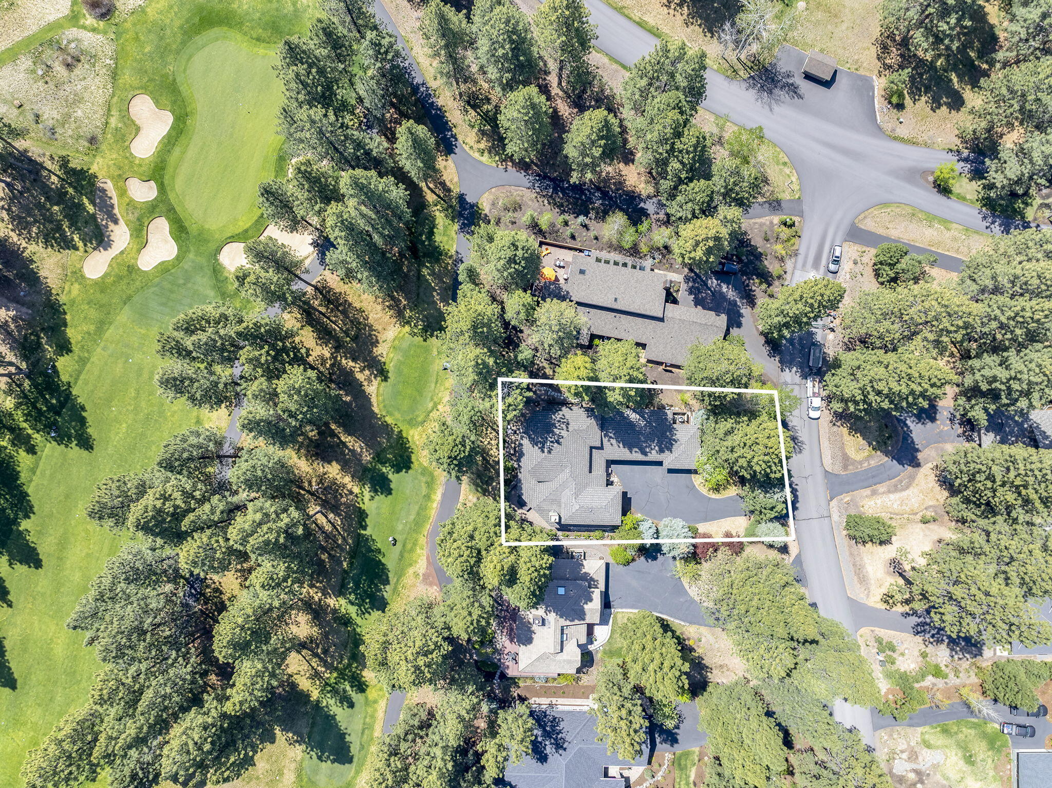 60766 Golf Village Loop Bend, OR 97702 - Photo 53 of 63 an aerial view of residential houses with outdoor space