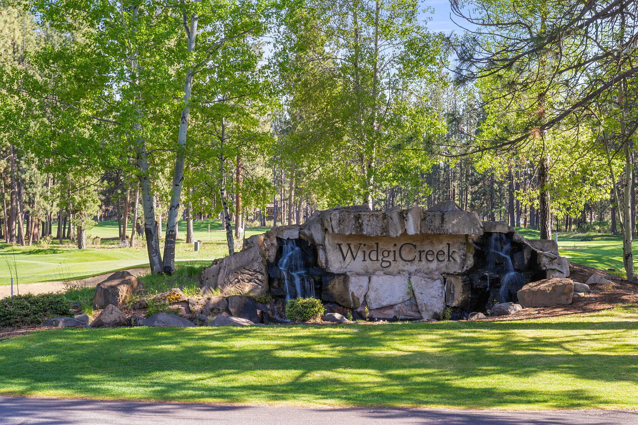 60766 Golf Village Loop Bend, OR 97702 - Photo 57 of 63 a view of a park with large trees