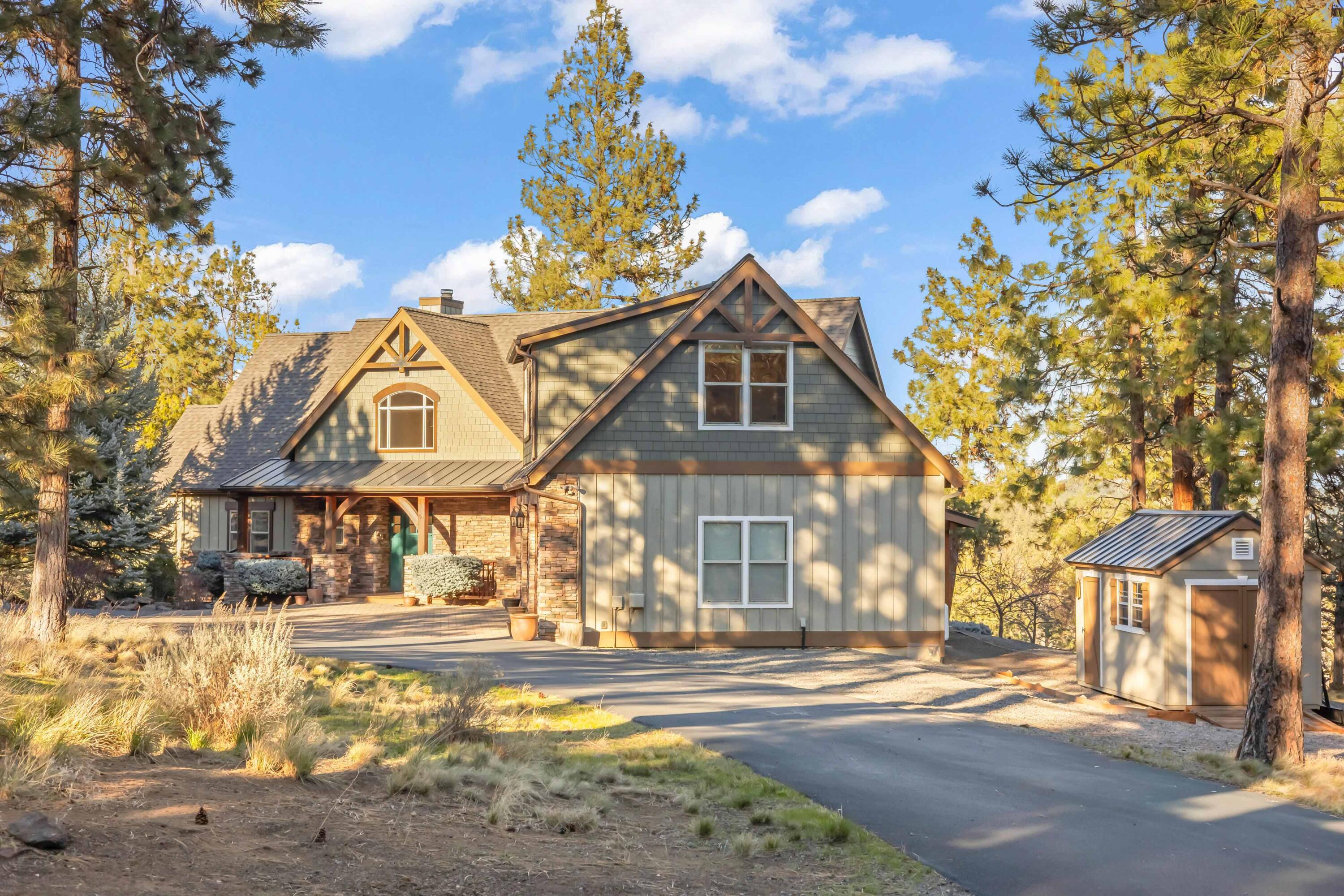 69590 Omaha Road Sisters, OR 97759 - Photo 40 of 46 a front view of a house with a yard