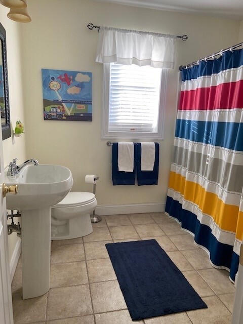 432 Quassapaug Road Woodbury, CT 06798 - Photo 15 of 21 a bath room with a rug and white walls