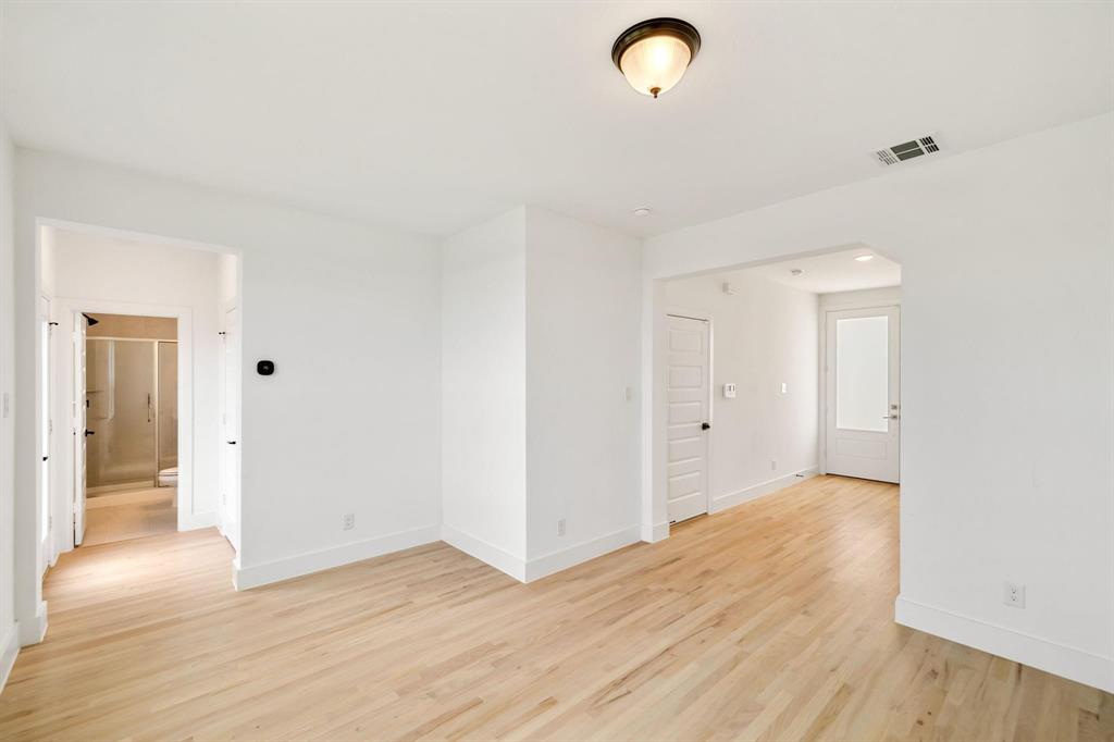 9303 Easy Street Rowlett, TX 75088 - Photo 20 of 33 a view of a livingroom with wooden floor